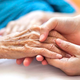 Two people holding hands.